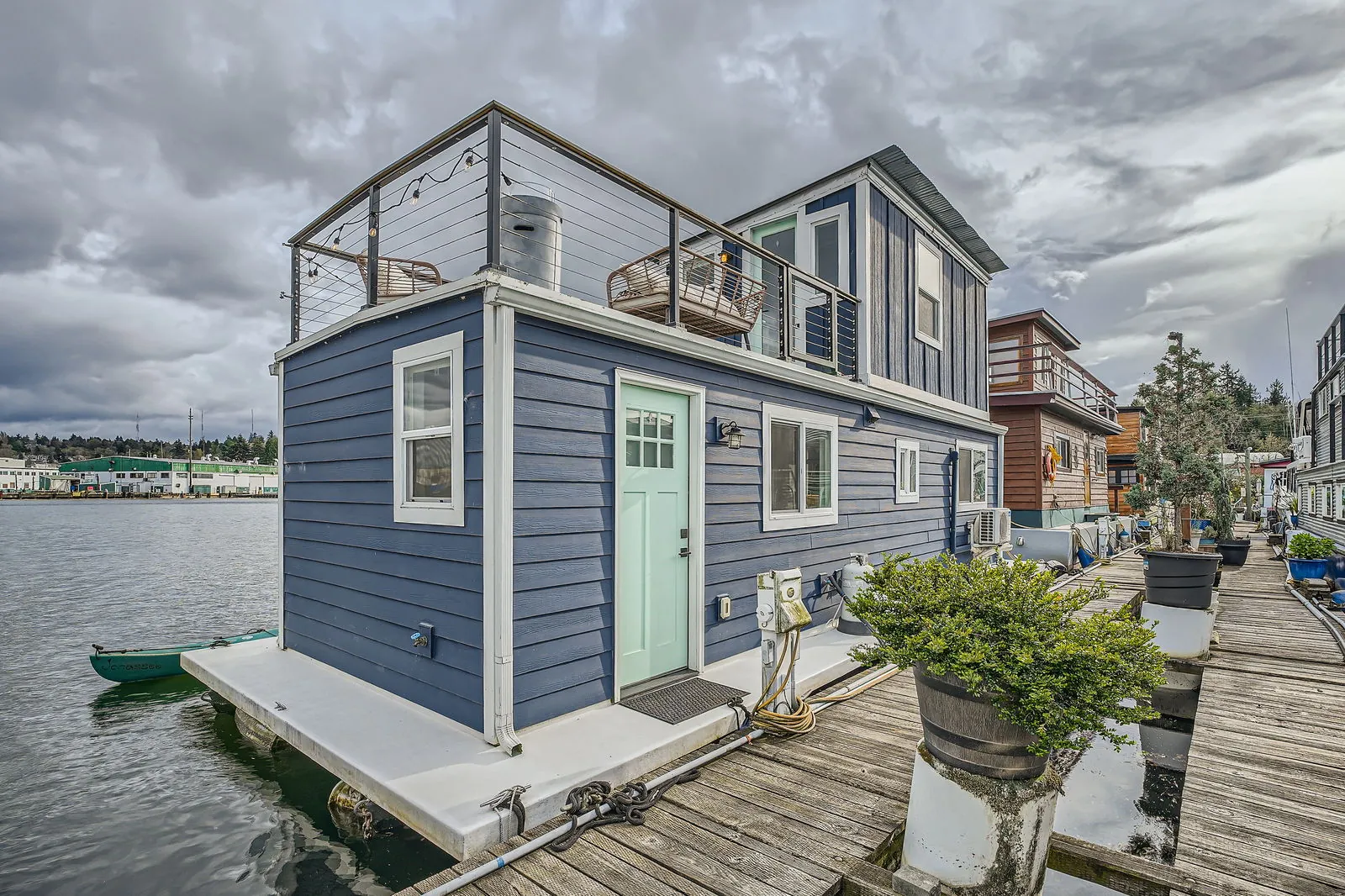 Houseboat along the Ship Canal near Ewing Street moorage